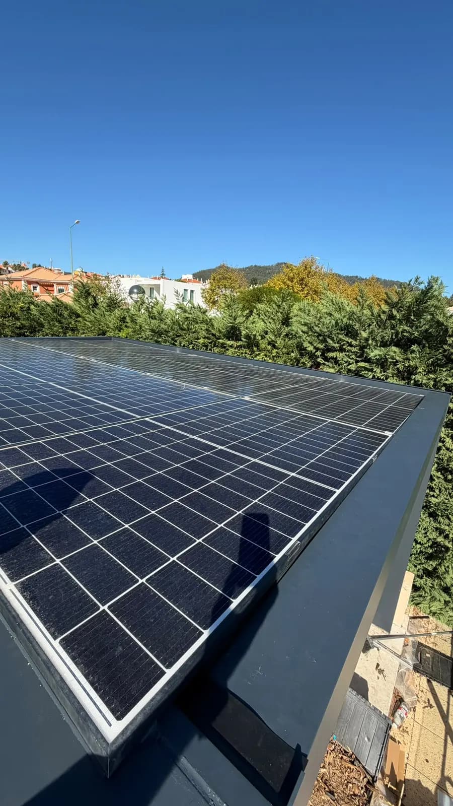 Original solar panels refitted on the new roof