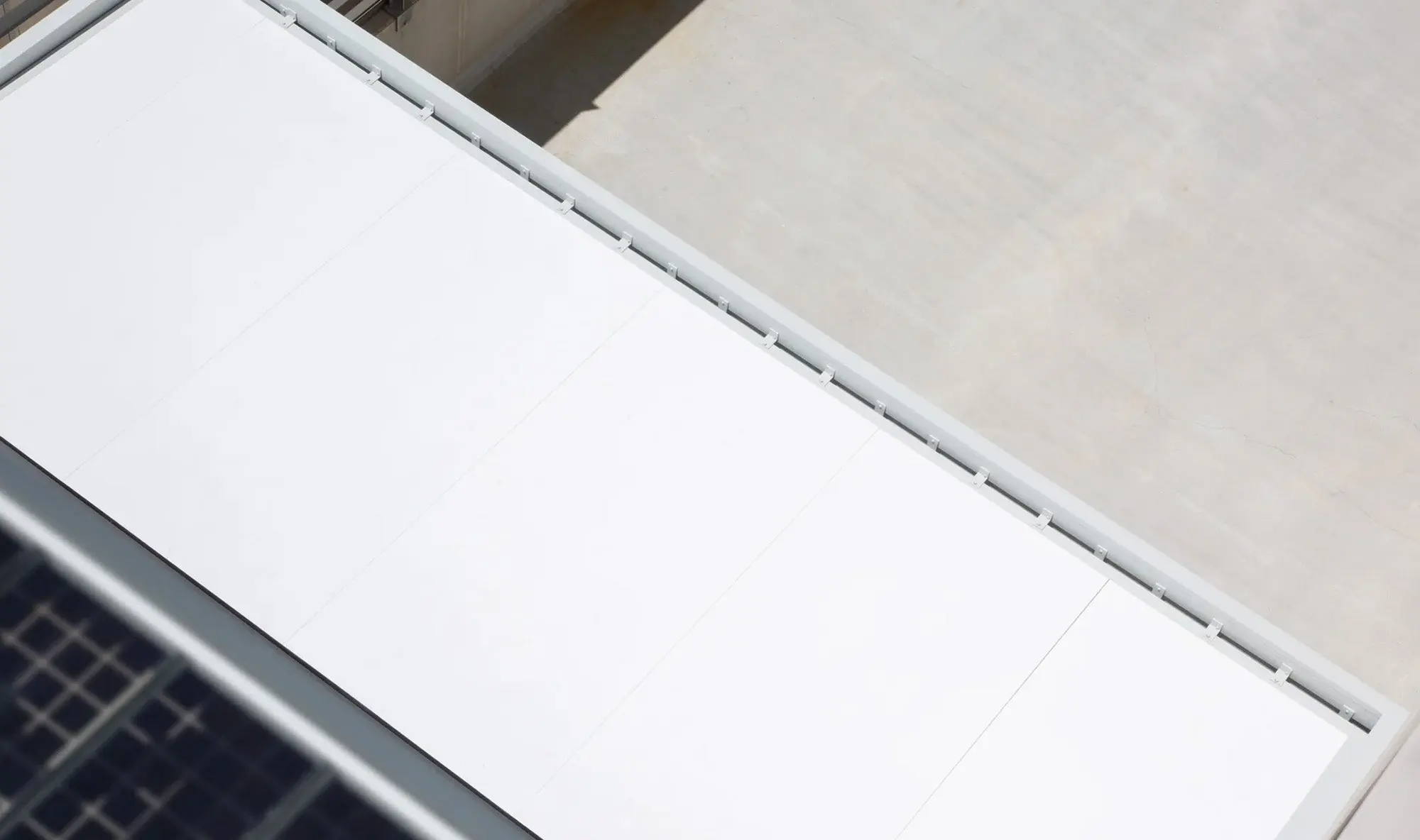 White roof of the Menorca pergola seen from below