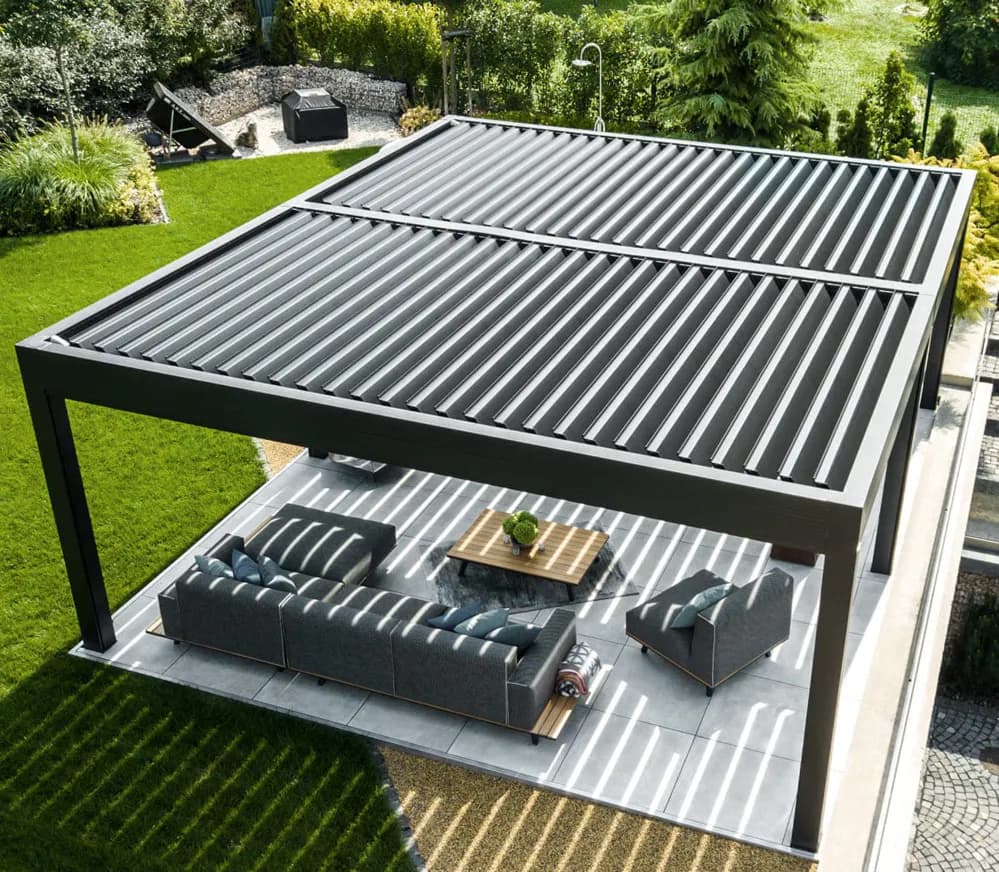 Backyard seating area with louvered pergola