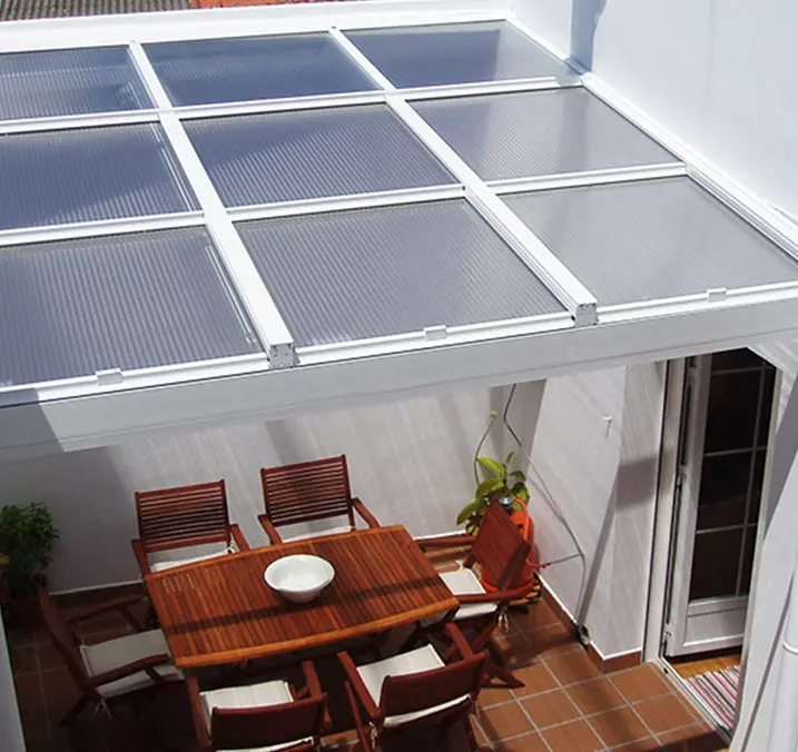 Patio covered by the Teulada, with a dining table